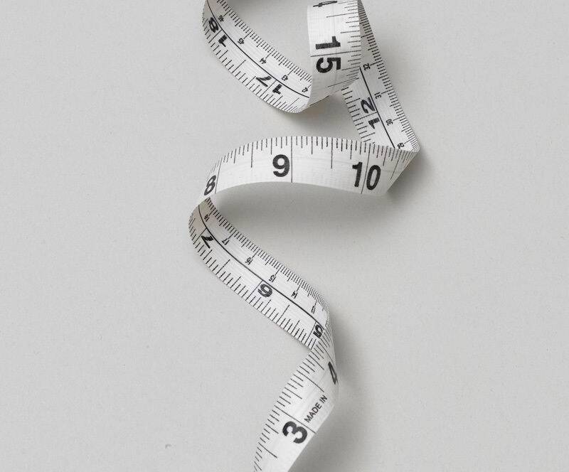 Measuring a gymnast for a leotard size